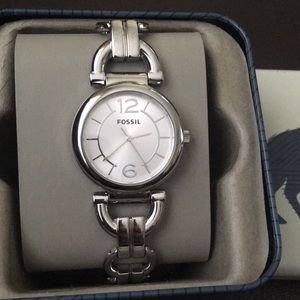 Women’s white gold Fossil wrist watch